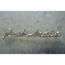 sigle "RUSHMATIC" doré